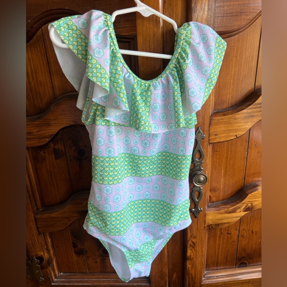 Janie and Jack one piece bathing suit girls size 7. Worn once.
